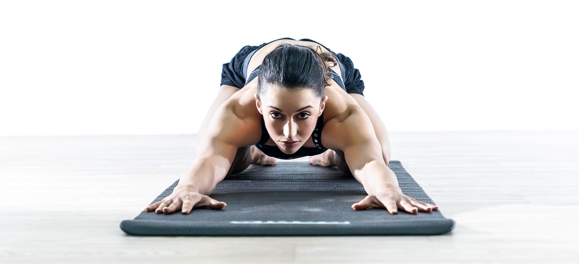 Sidea eco-friendly cork yoga & pilates mats laid out in a fitness studio