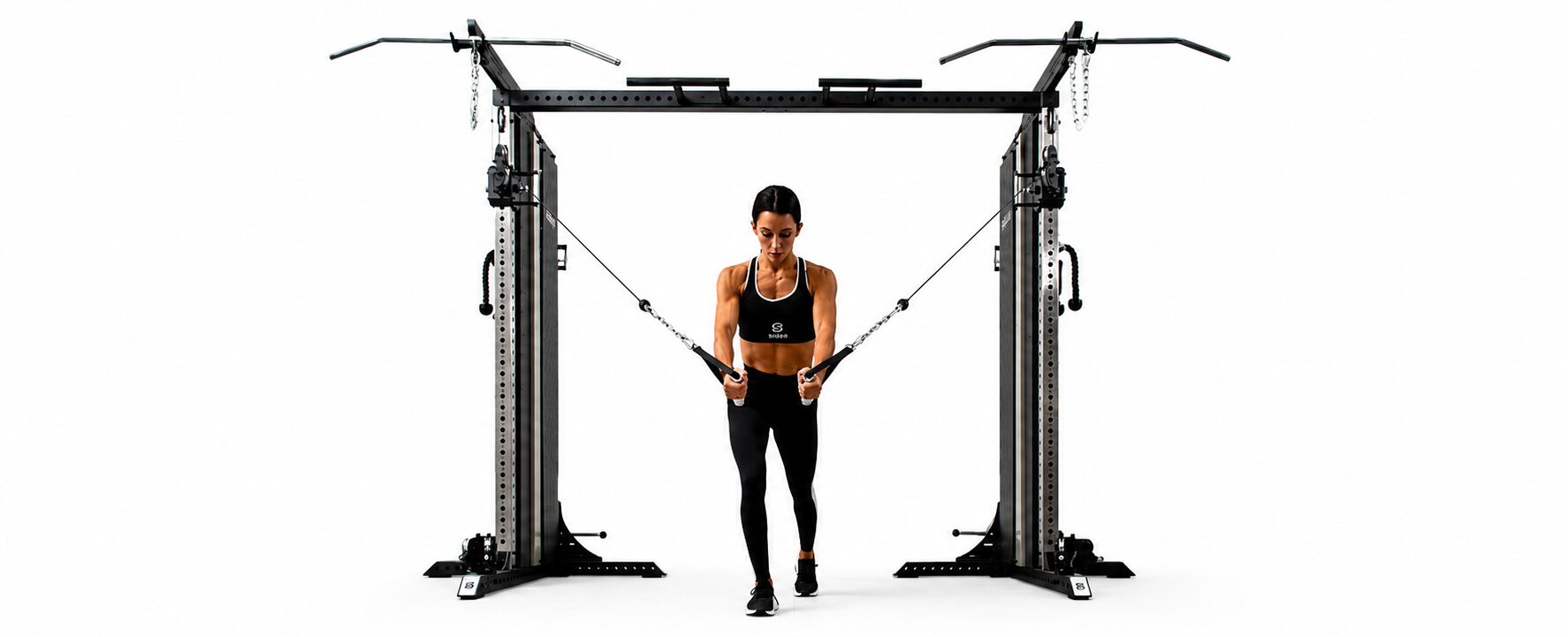 Athlete using a dual cable station for functional training